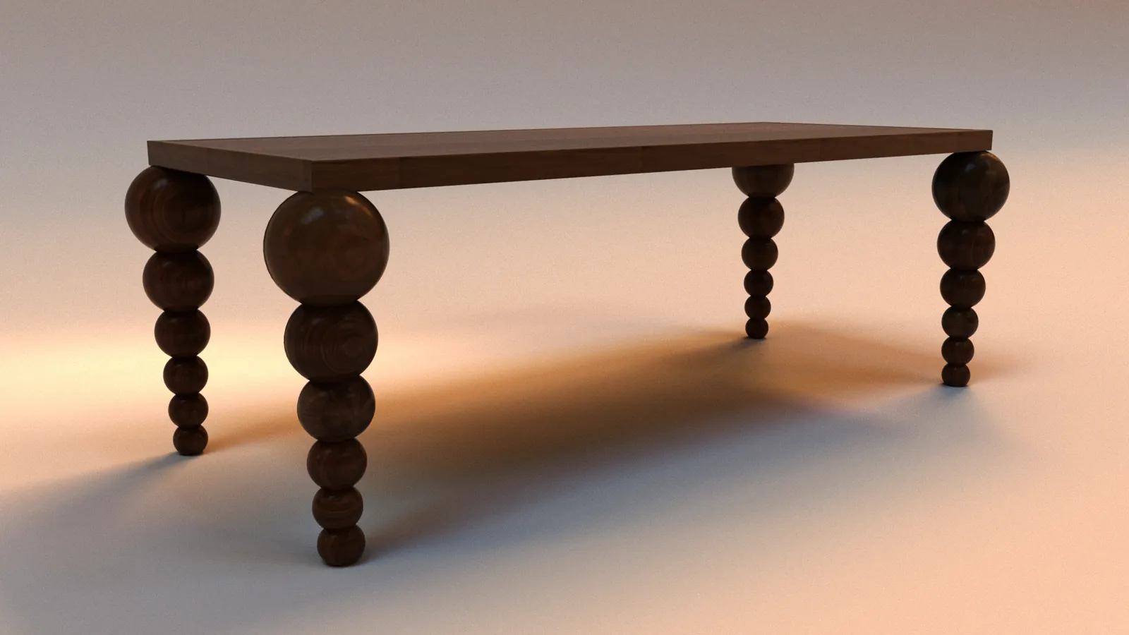 The Orbital dining table, legs of stacked wooden spheres